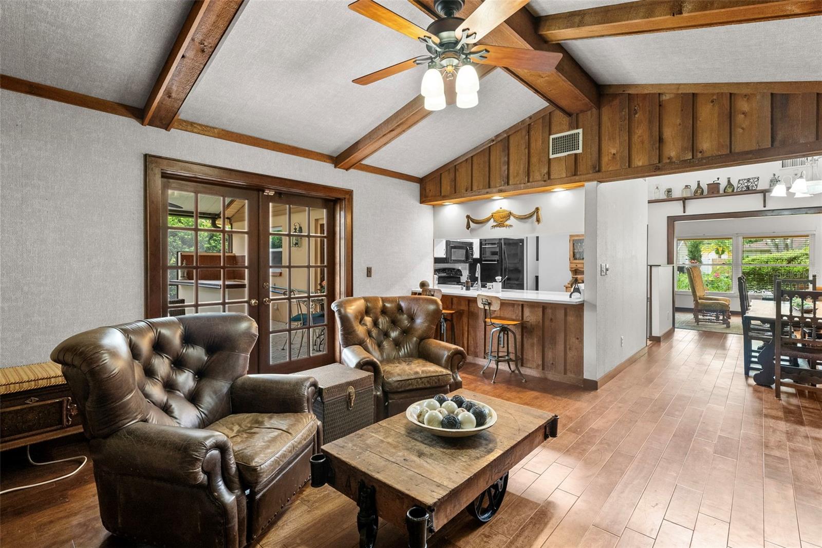 Another vie wof family room/kitchen/dining room/lanai layout