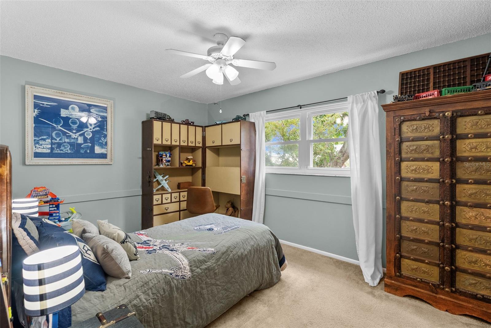 Bright and versatile third bedroom with brand-new window (2025).