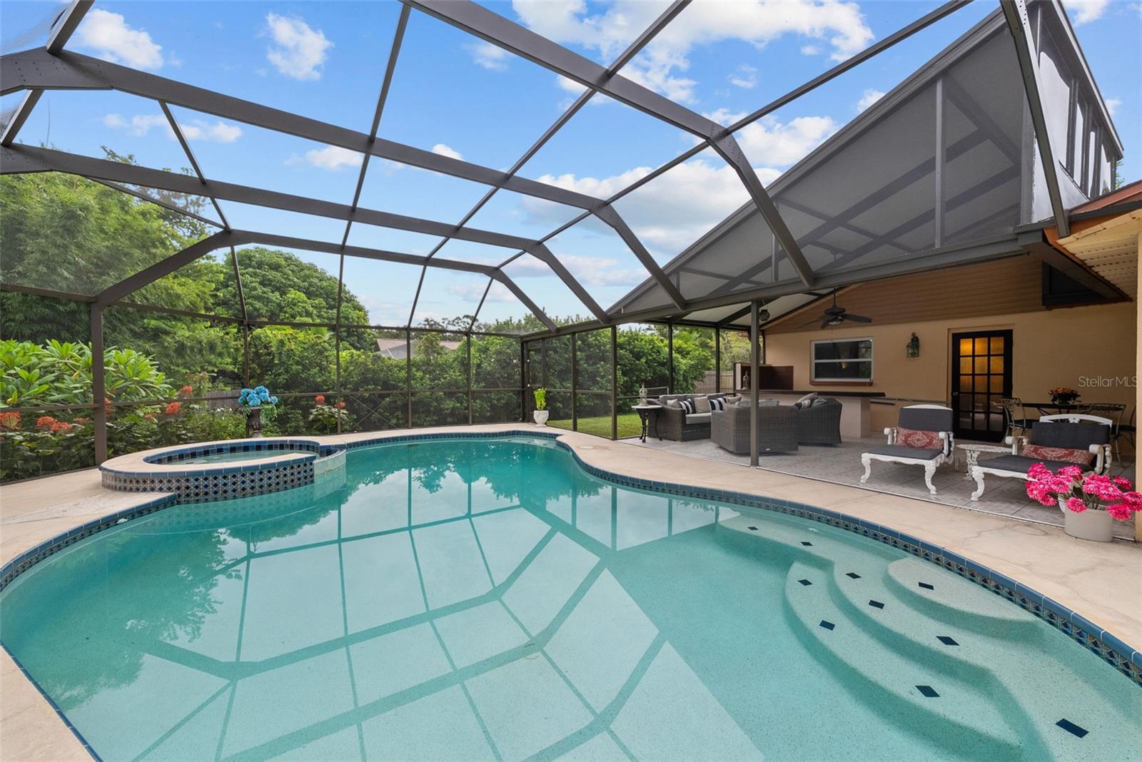Another view of pool and heated spa