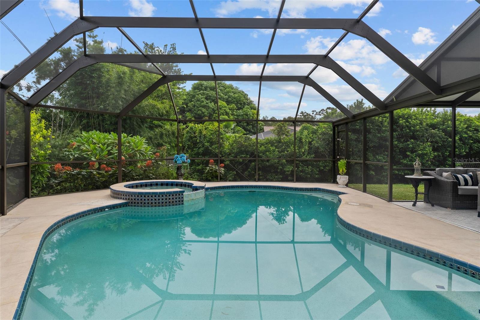 3rd view of large pool and heated spa.