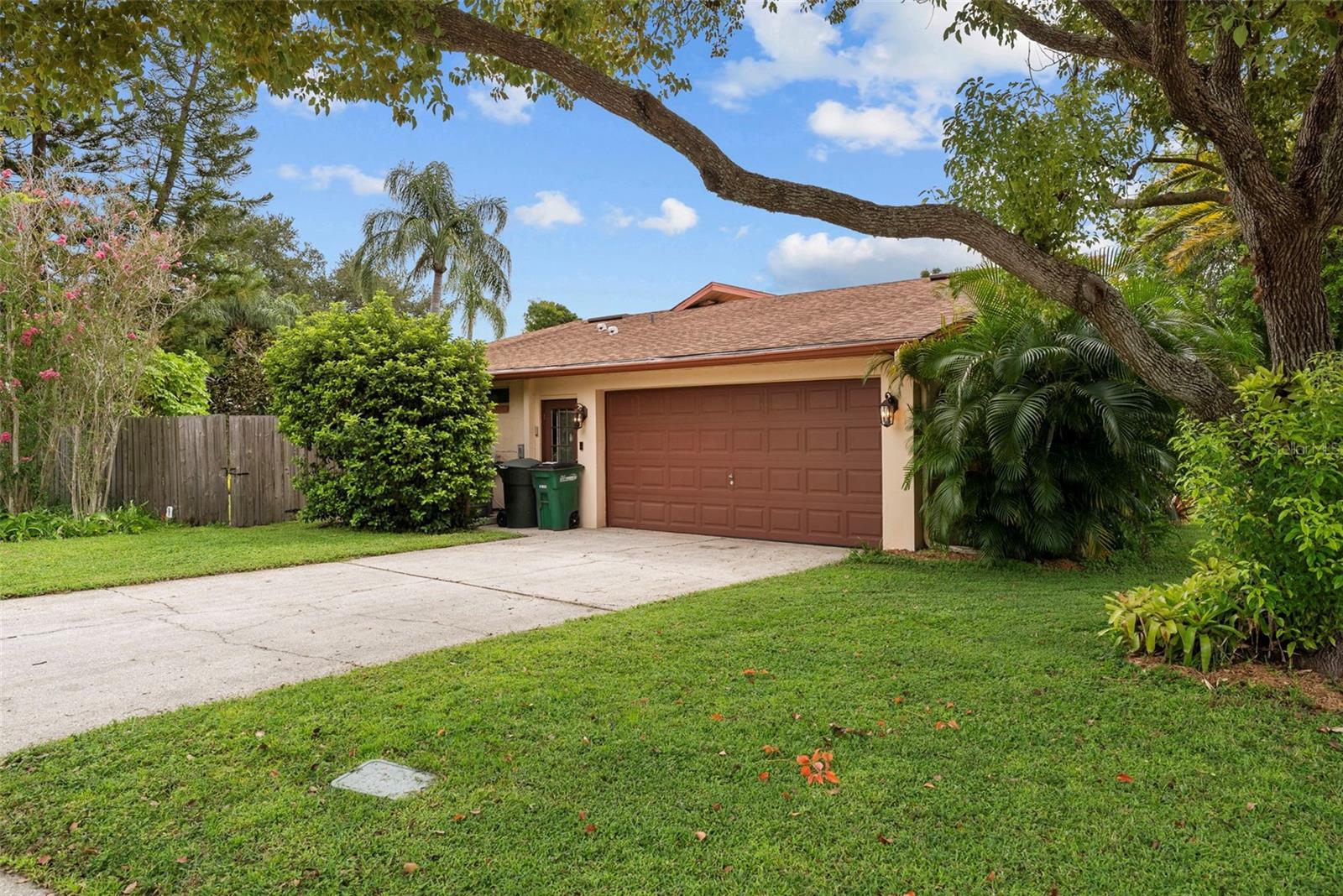Two-car garage with epoxy-finished floor (2025) and abundant storage space.