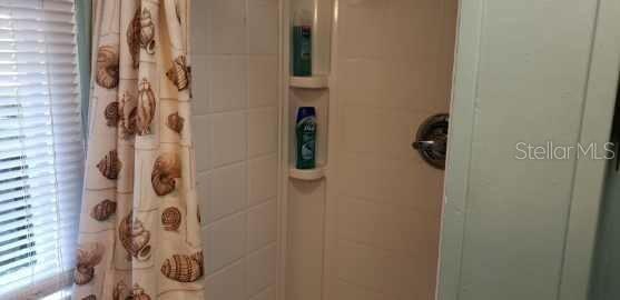 Cottage stand up shower in bathroom