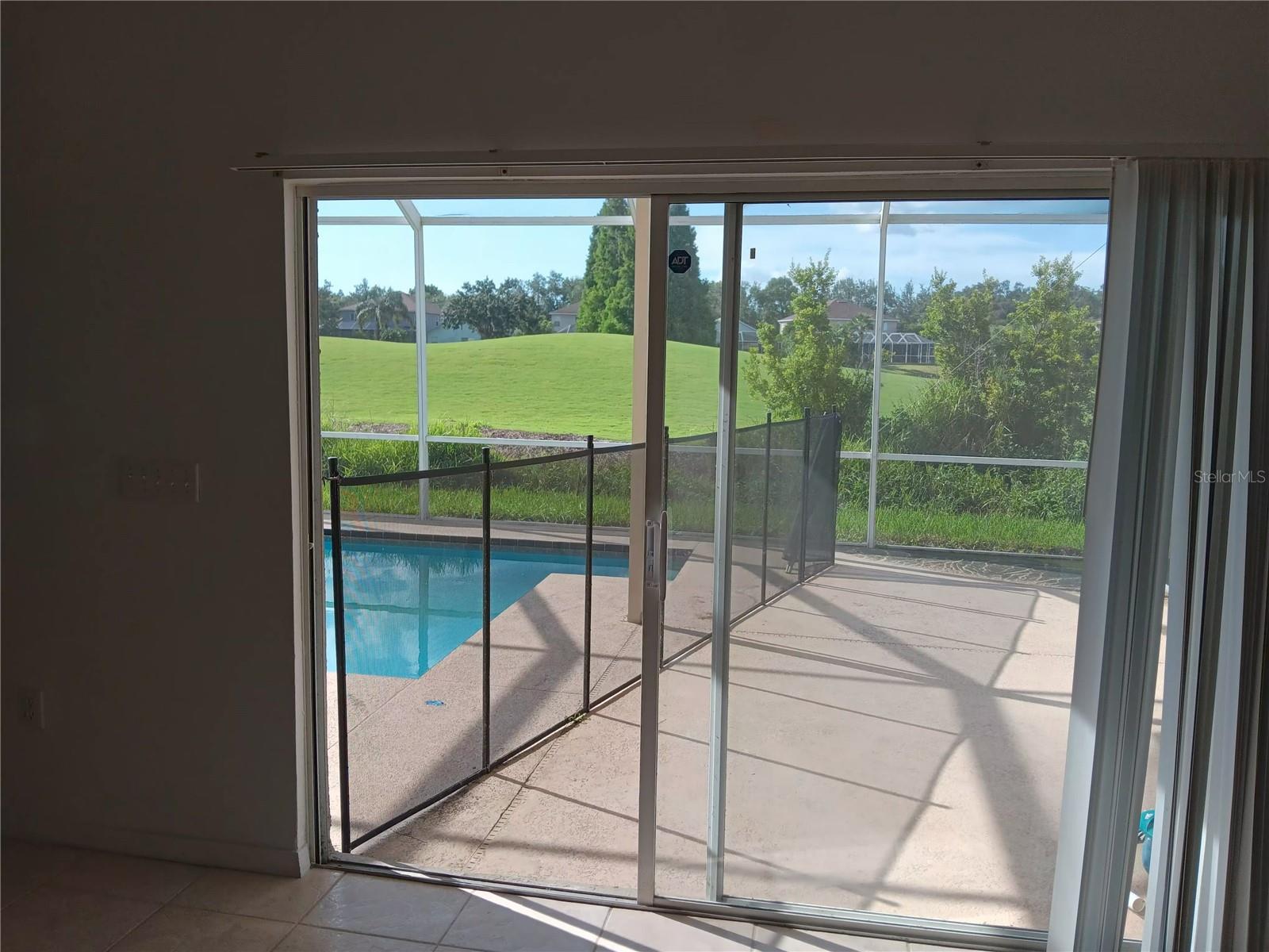 sliding door to Lani and pool