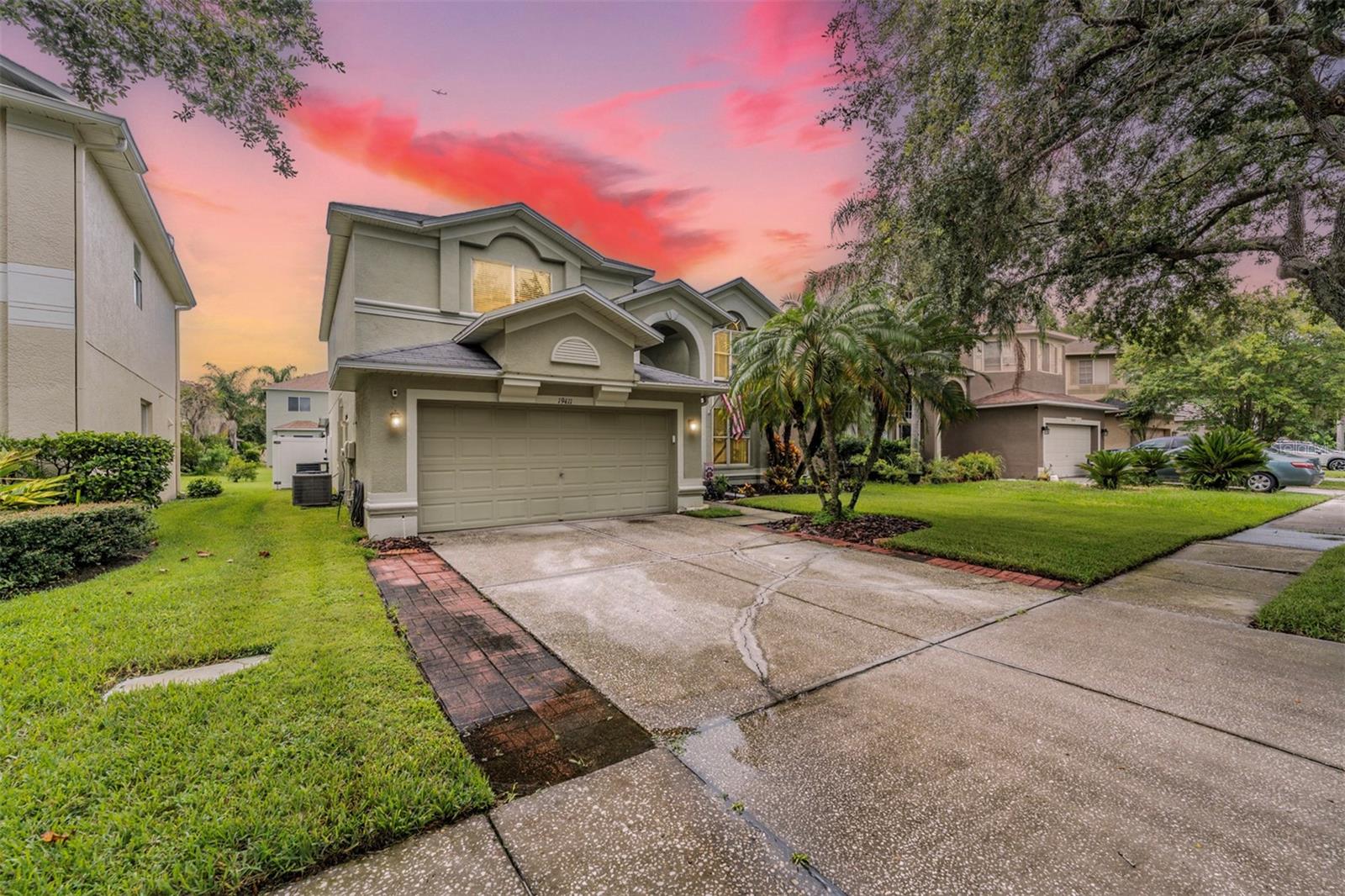 Front Exterior 6 bedrooms/3 Bathrooms (one bedroom/bathroom downstairs) 2 Car Garage, Fenced in Backyard3111 Sq Ft