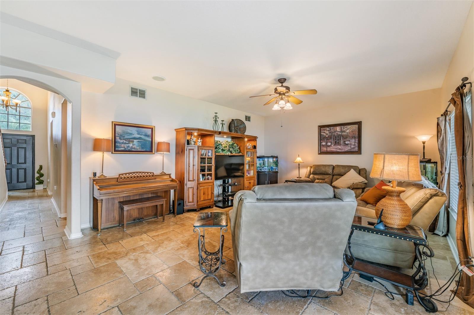 Spacious Family Room with ceiling fan/light fixture