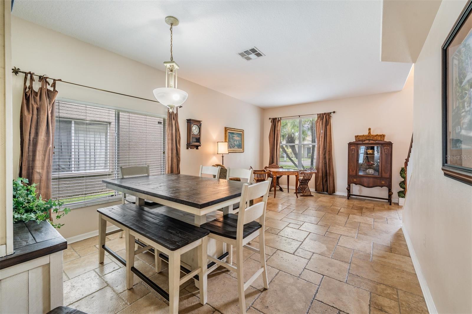Dining Room and Living with Tile Flooring.