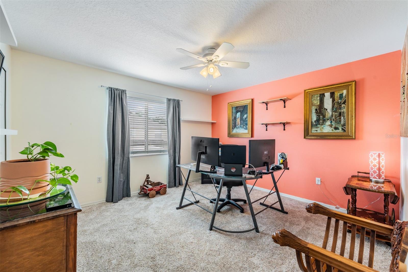 Guest Bedroom or Office/Den, Newer Carpet and Ceiling Fan with light fixture.