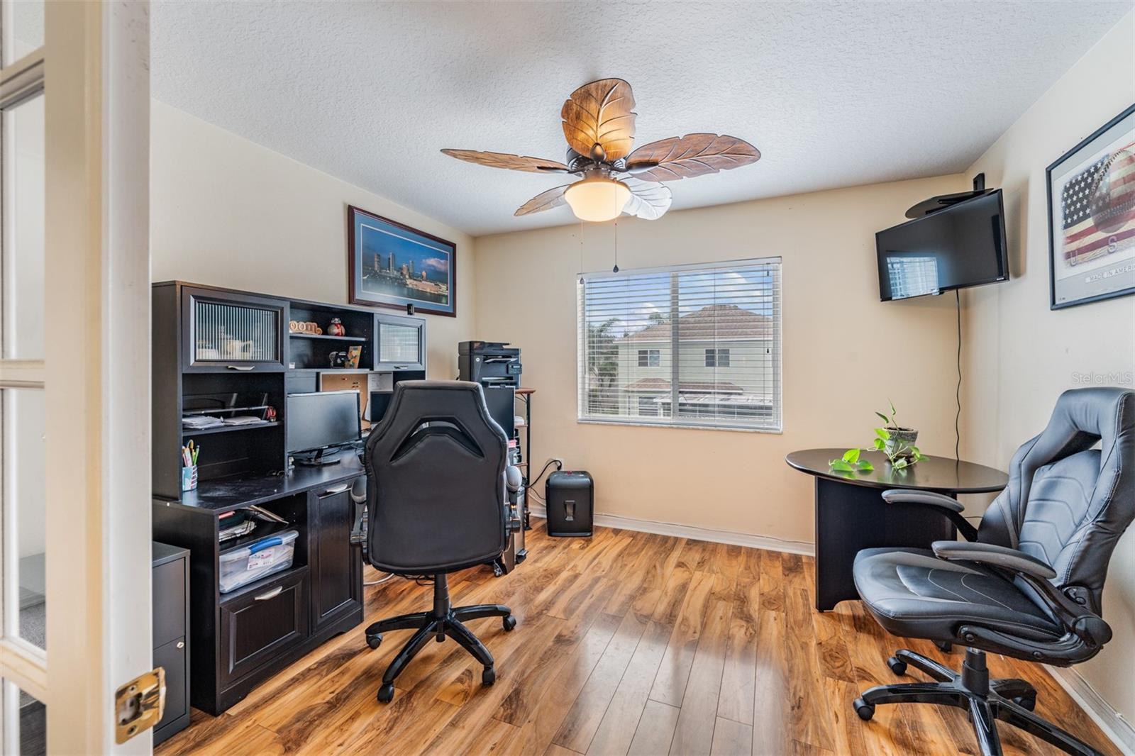 Office/Den with French Doors, Ceiling Fan with light fixture.