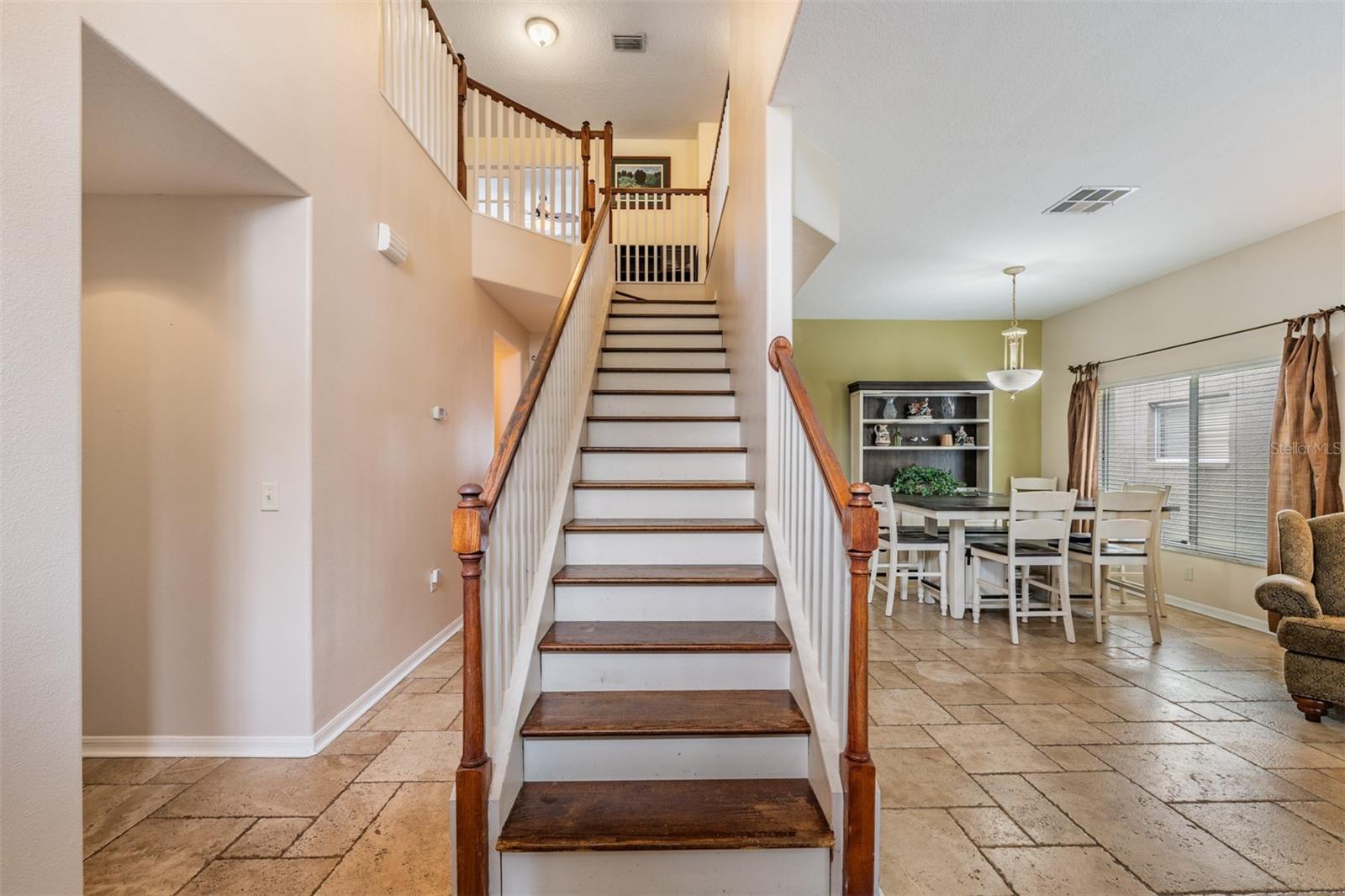 First Floor Entry Way: Dining Room/Living Room combo with tile flooring