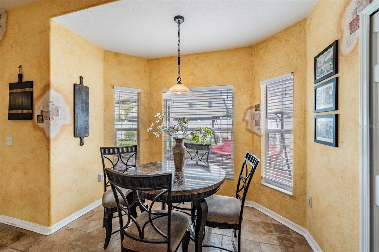 Dinette area in the kitchen overlooking the back yard
