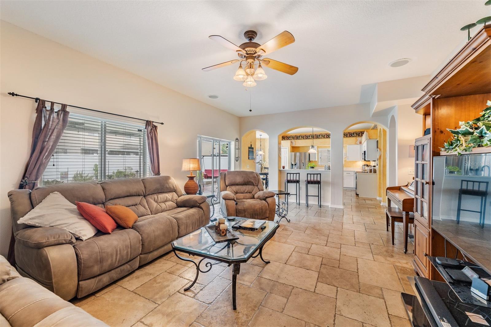 Spacious Family Room with ceiling fan/light fixture