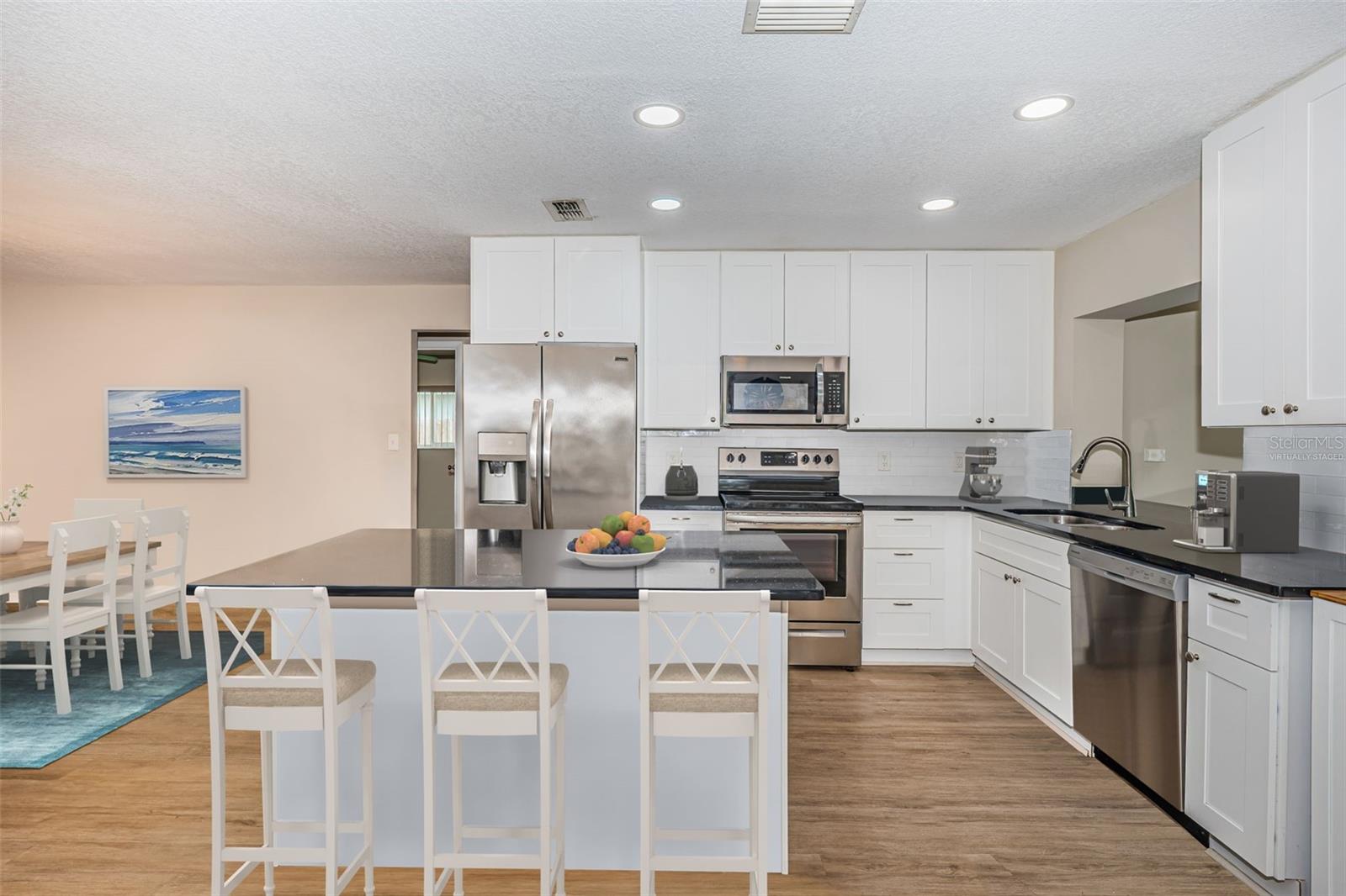 Cozy kitchen with island-virtually staged