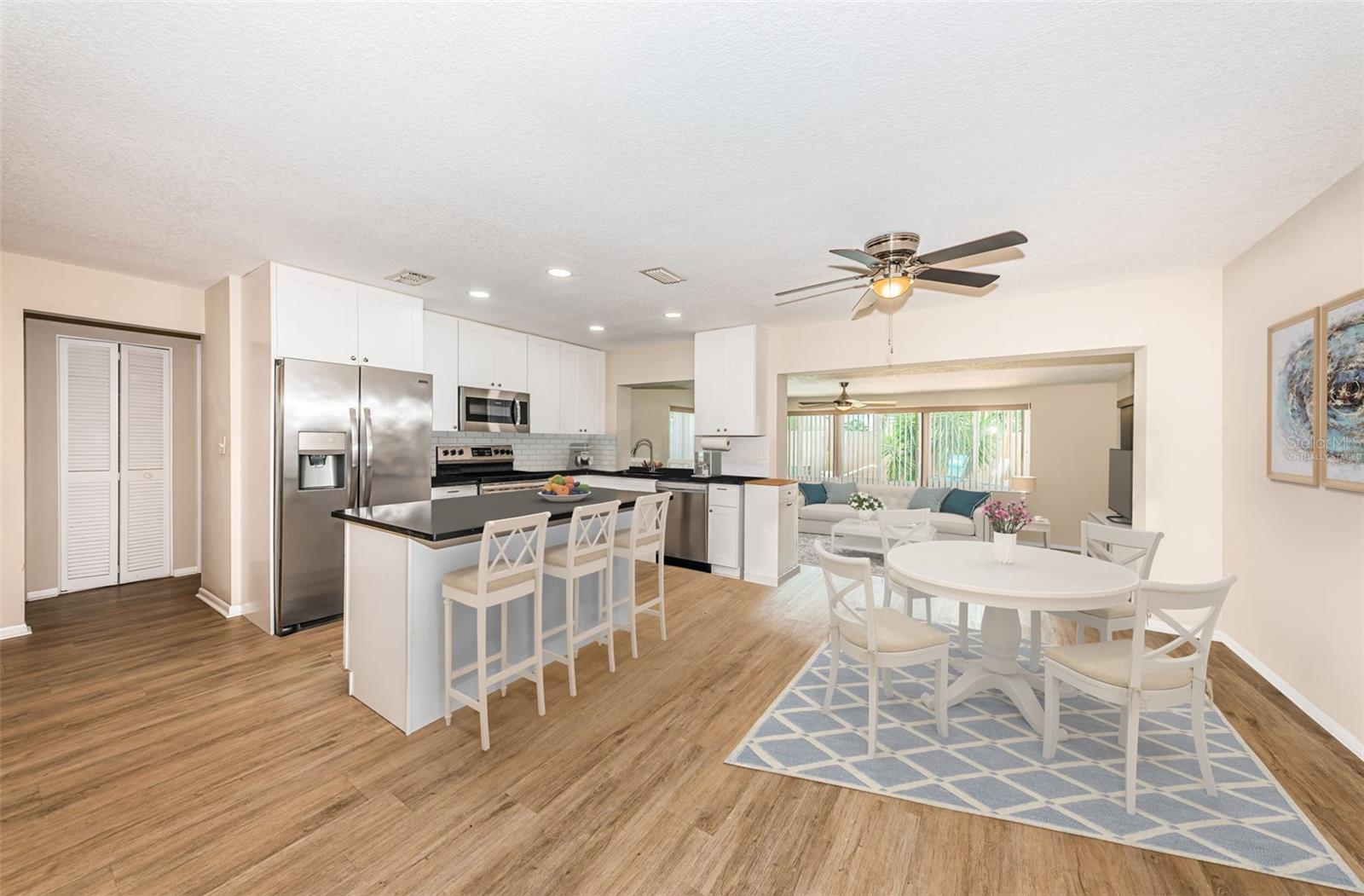 Kitchen and eating area virtually staged
