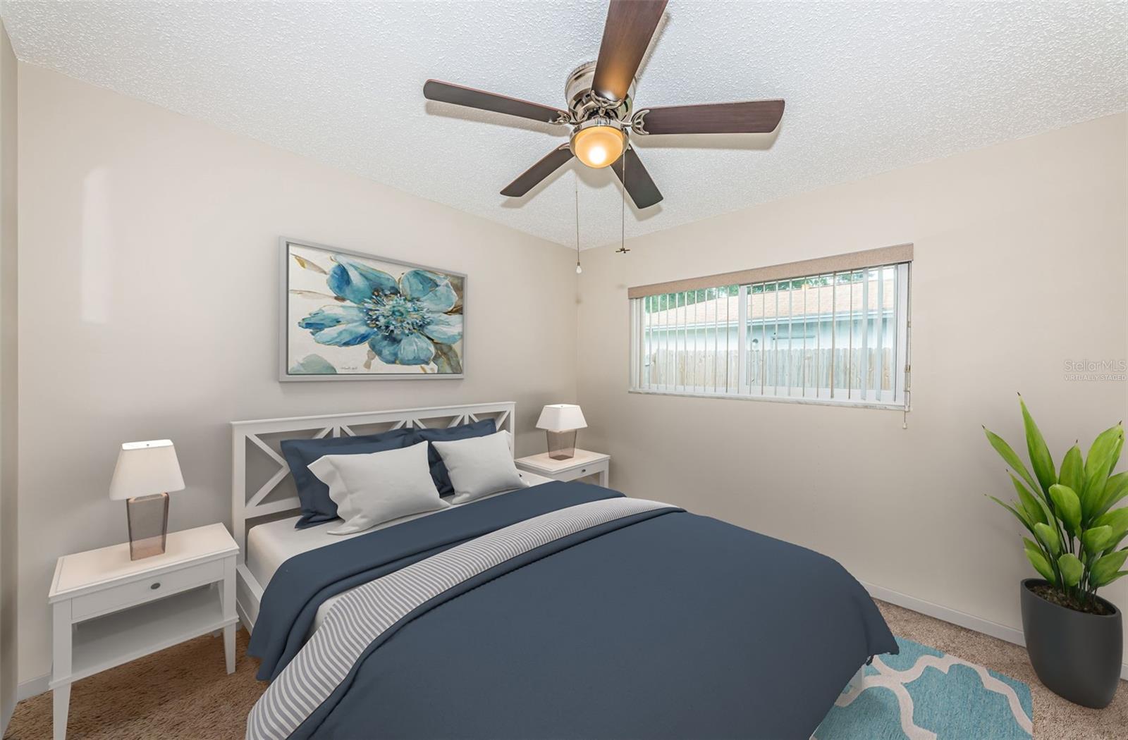 2nd Bedroom-looks out to backyard- virtually staged