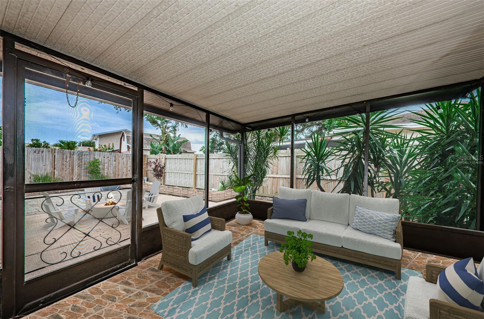 Screened in and covered Patio, virtually staged