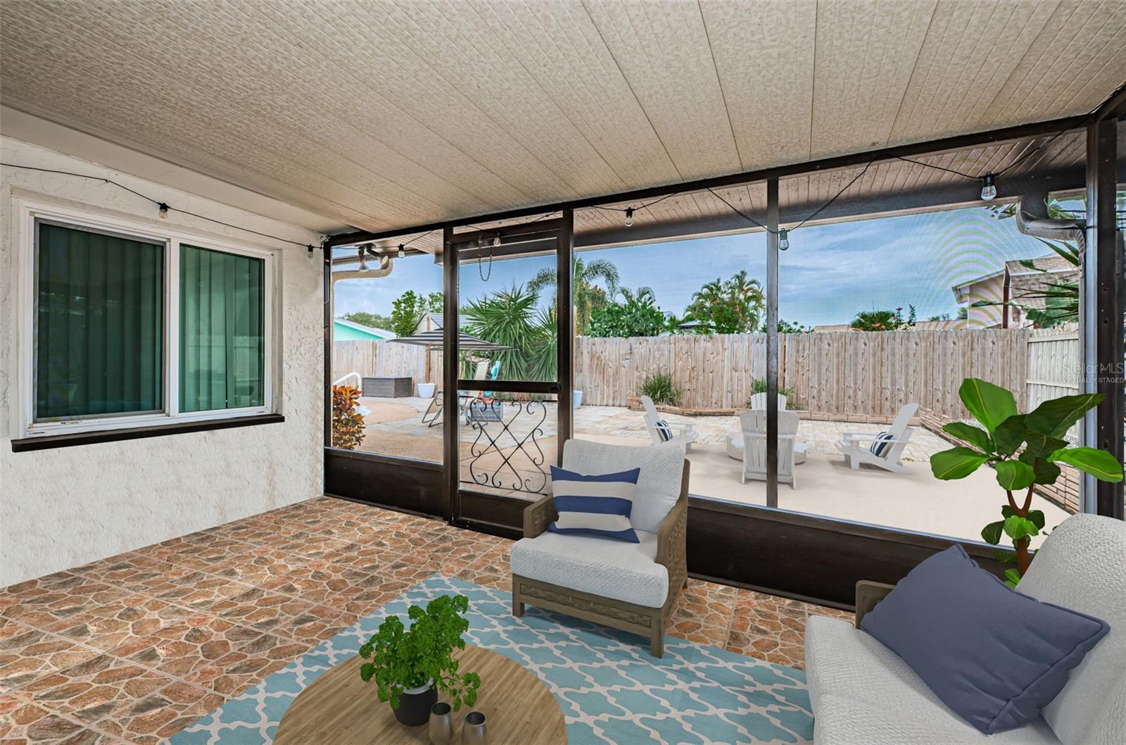 Screened in and covered patio virtually staged