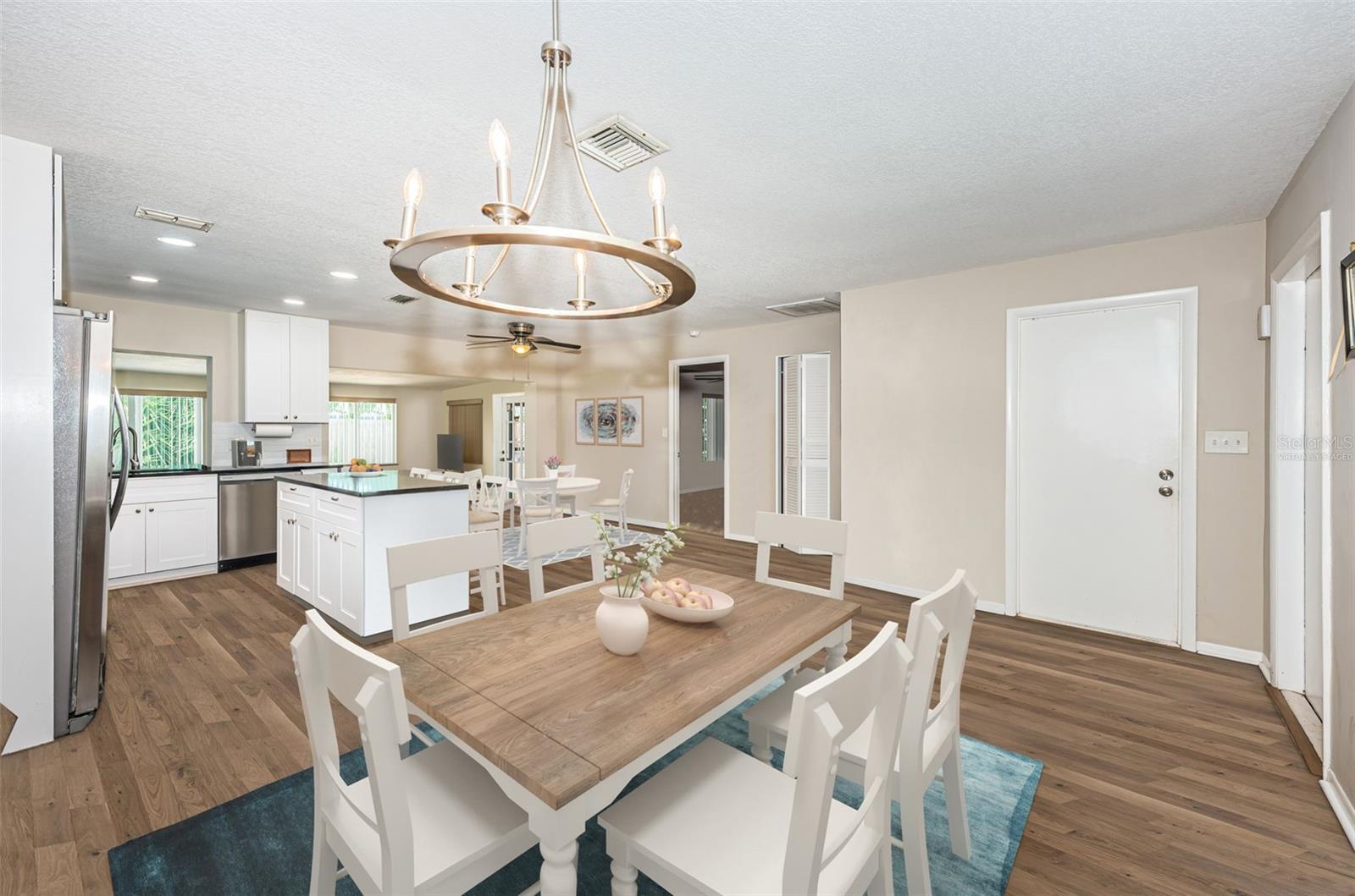 Kitchen and dining area-virtually staged