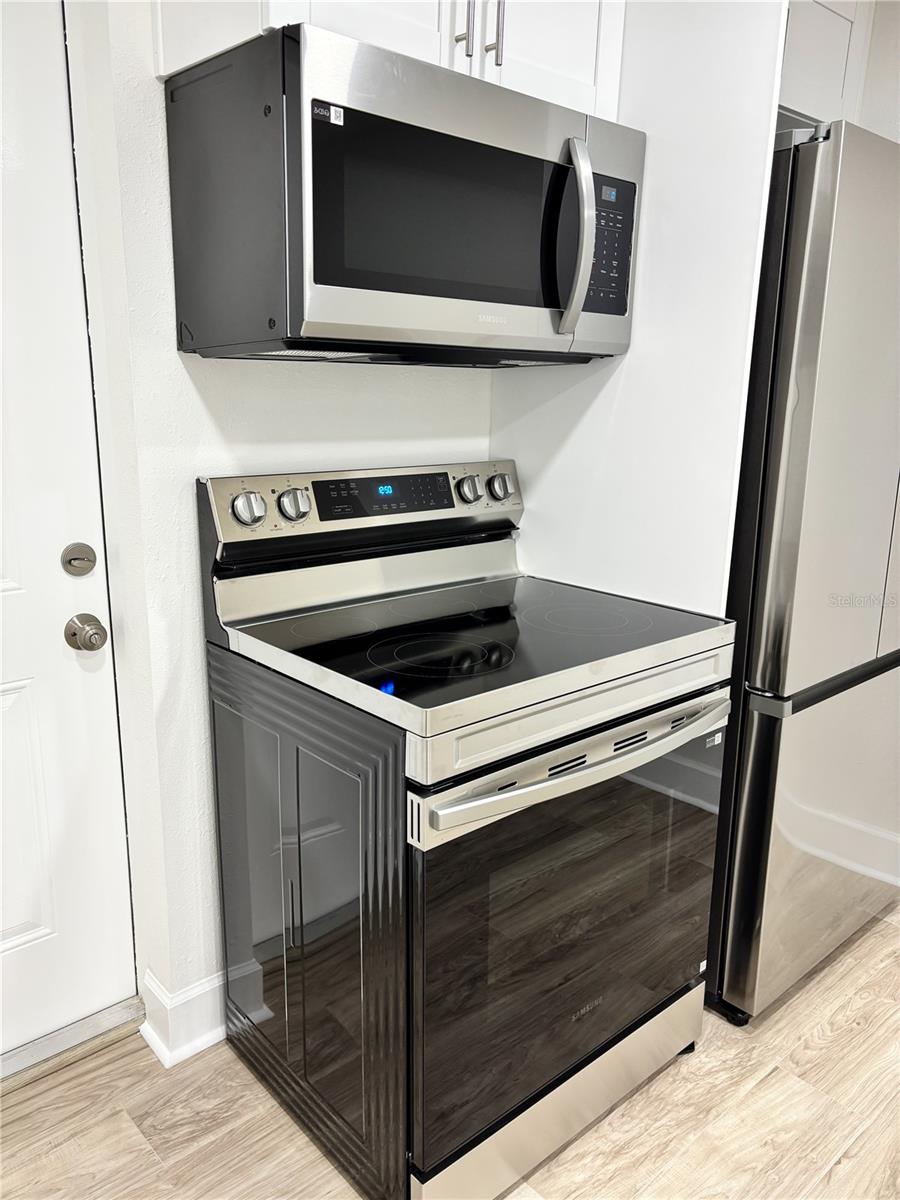 Kitchen: stove and microwave