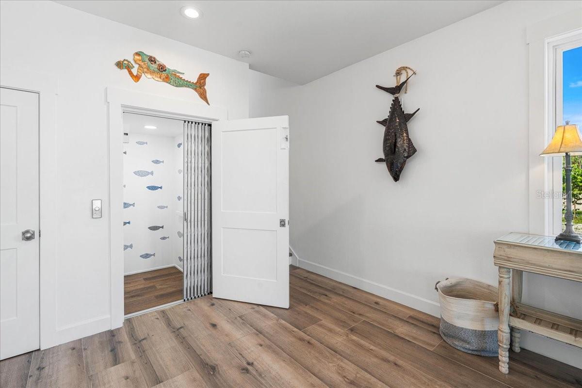 1st Floor: Front Entrance,  Foyer view, Elevator Entrance