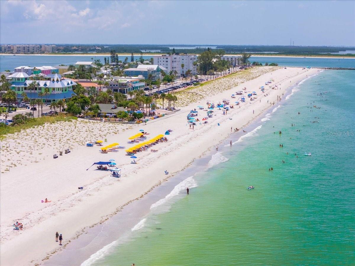 Pass-A-Grille Beach looking South, the Hurricane Restaurant and Paradise Grille visible.