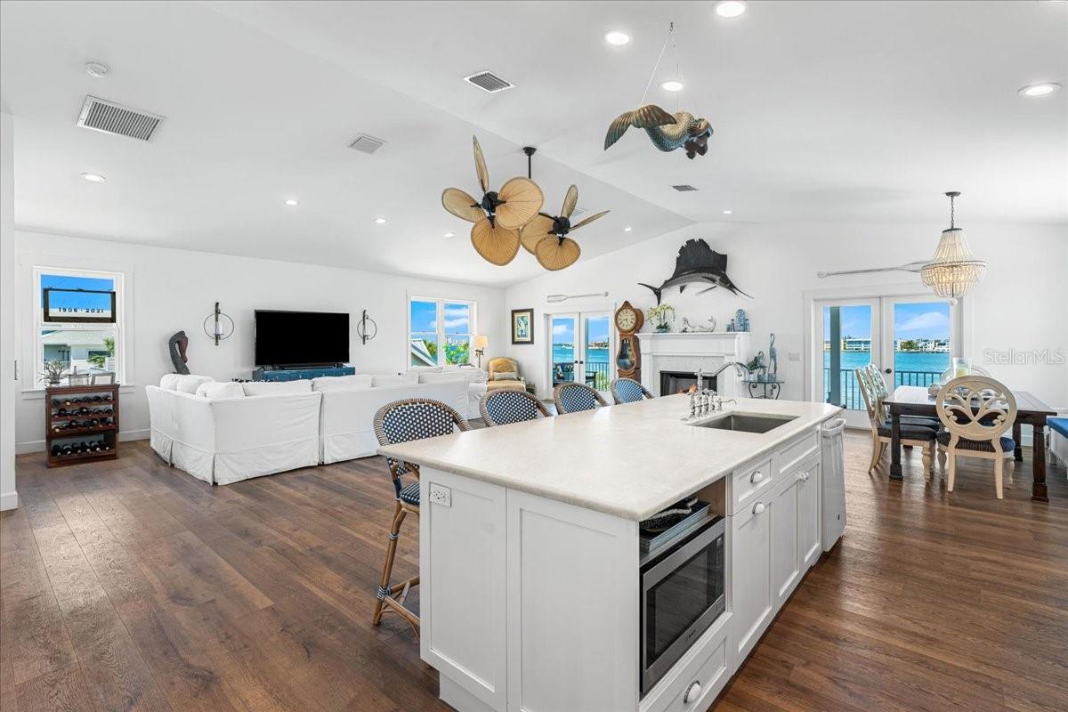 3rd Floor: View of Kitchen Island to the living and dining areas