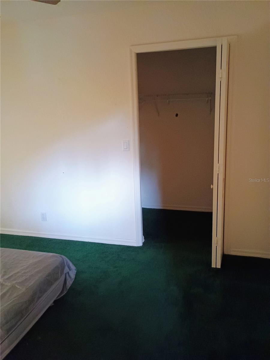 Guest room and walk-in closet