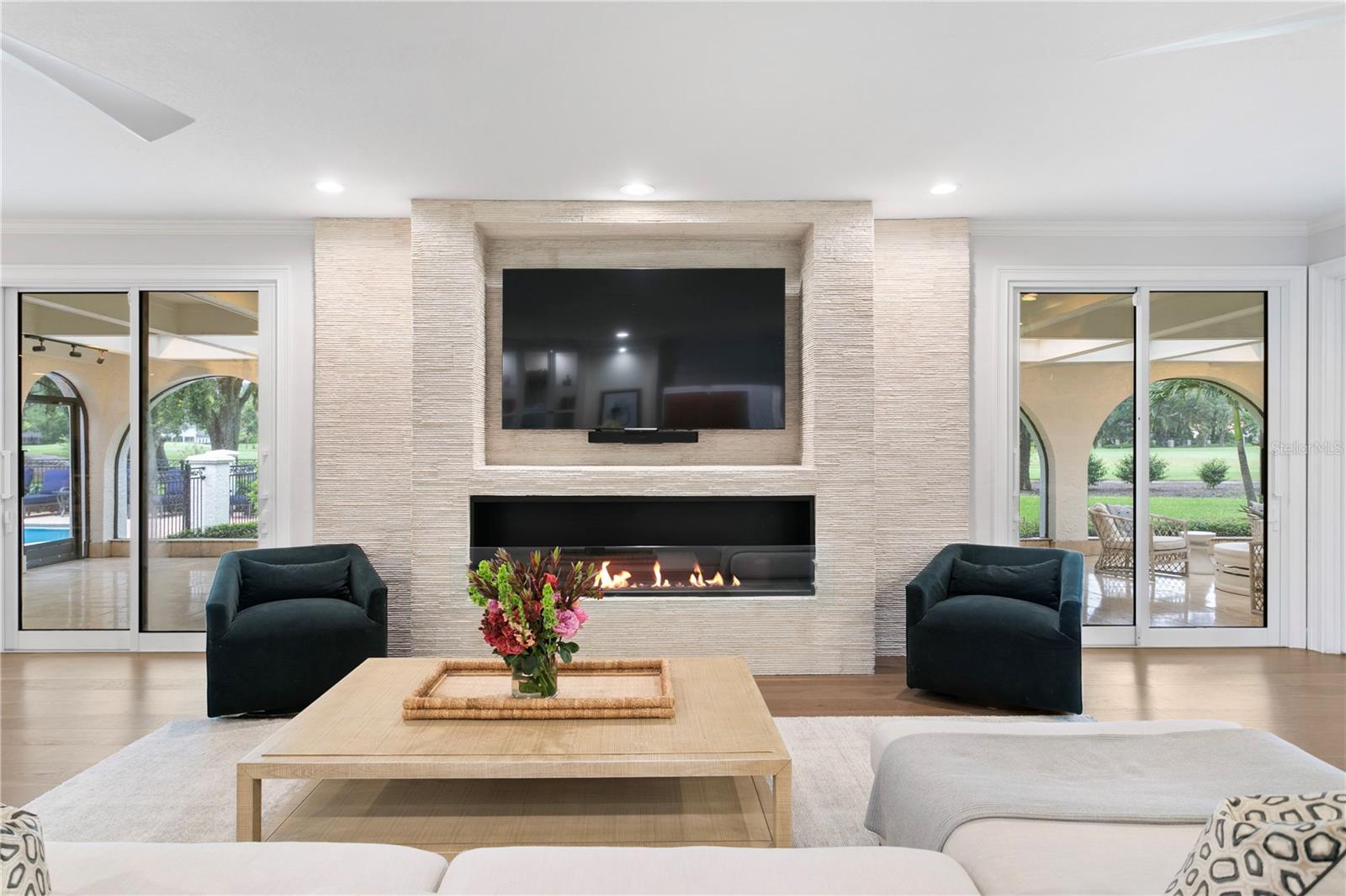 Family Room with Impressive Stone FP
