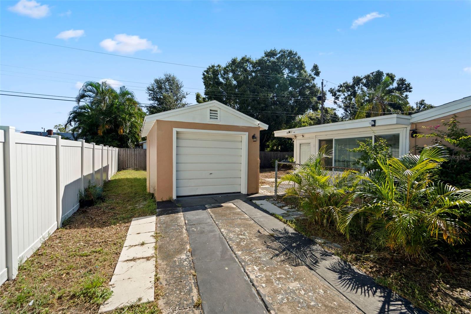 One car garage with extended parking.