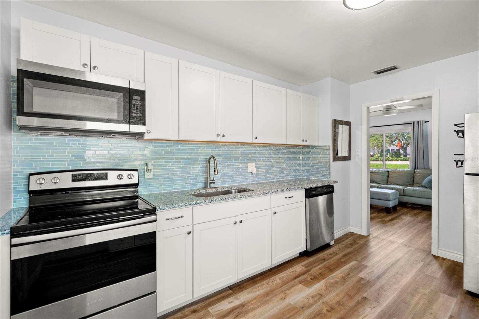 The kitchen, found in the heart of the home, is a standout.