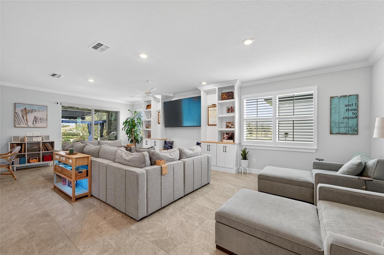 Great room with built in cabinets