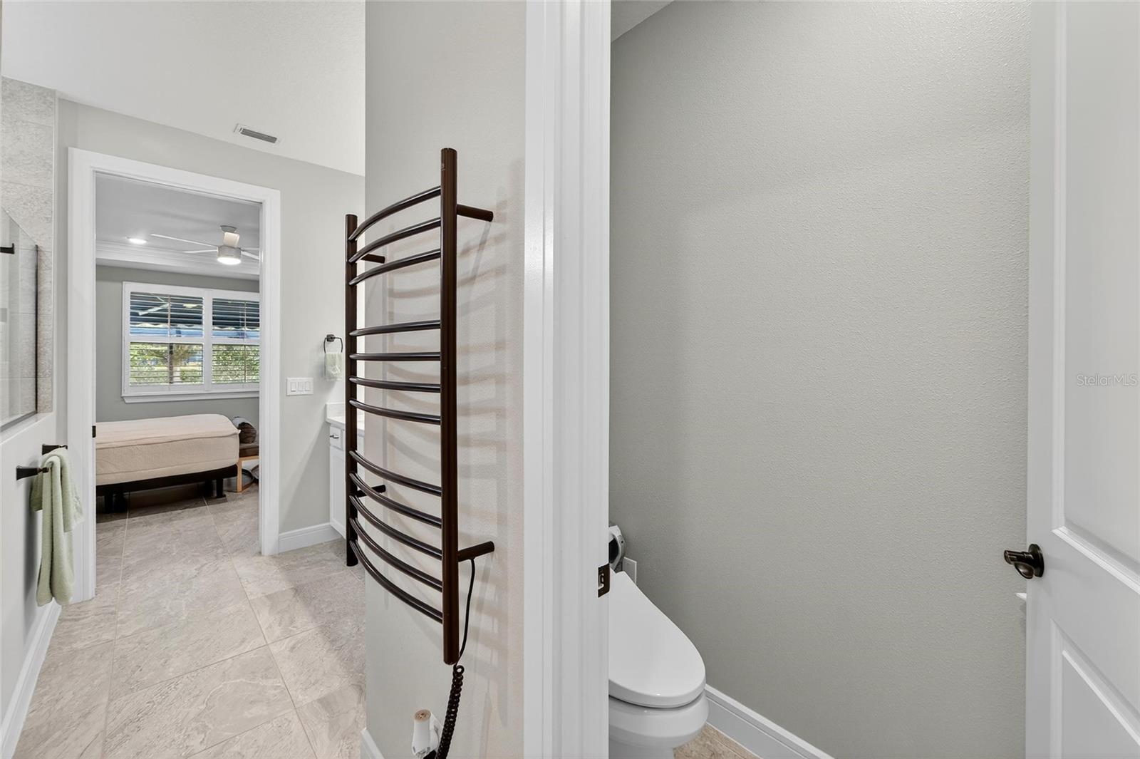 Primary bathroom with heated towel rack