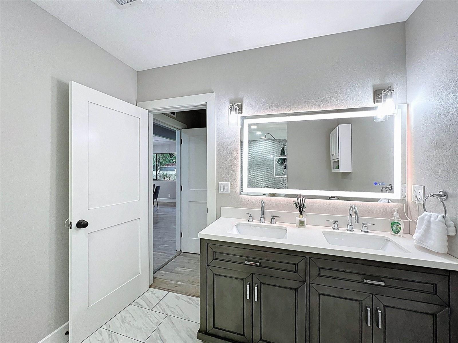 double vanity with LED lighted anti-fog mirror