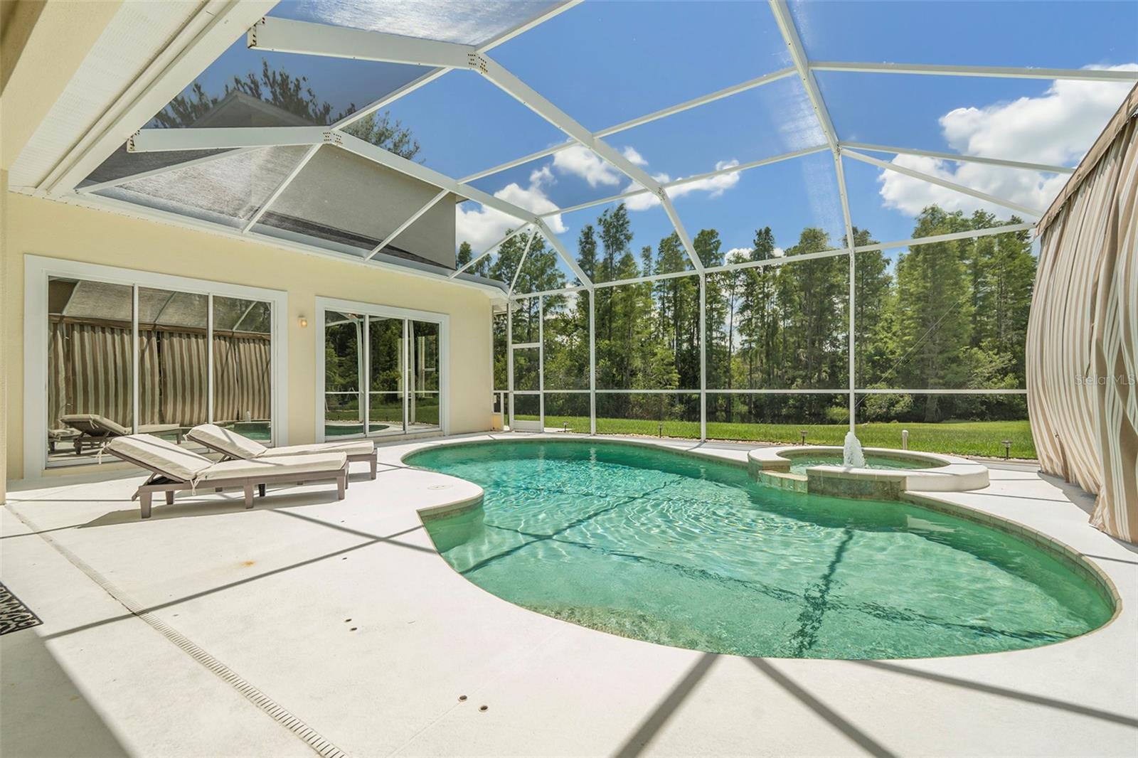 Pool with Four Entries and Views from House