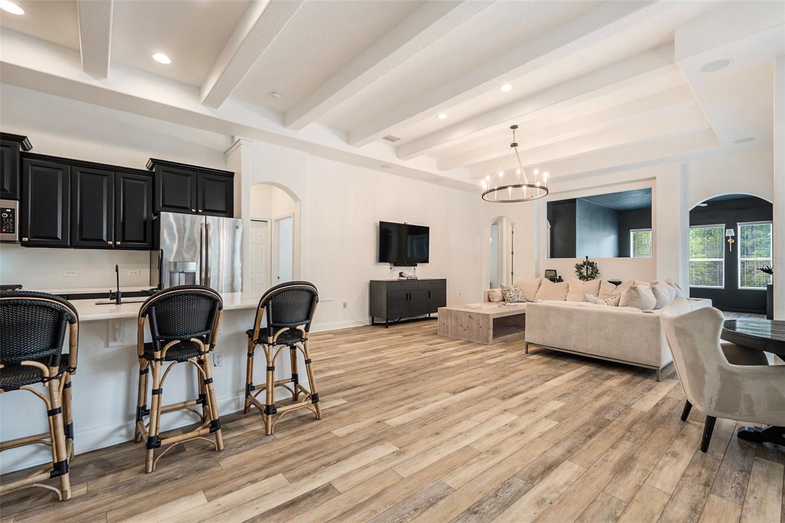 Kitchen into Family Room and Den