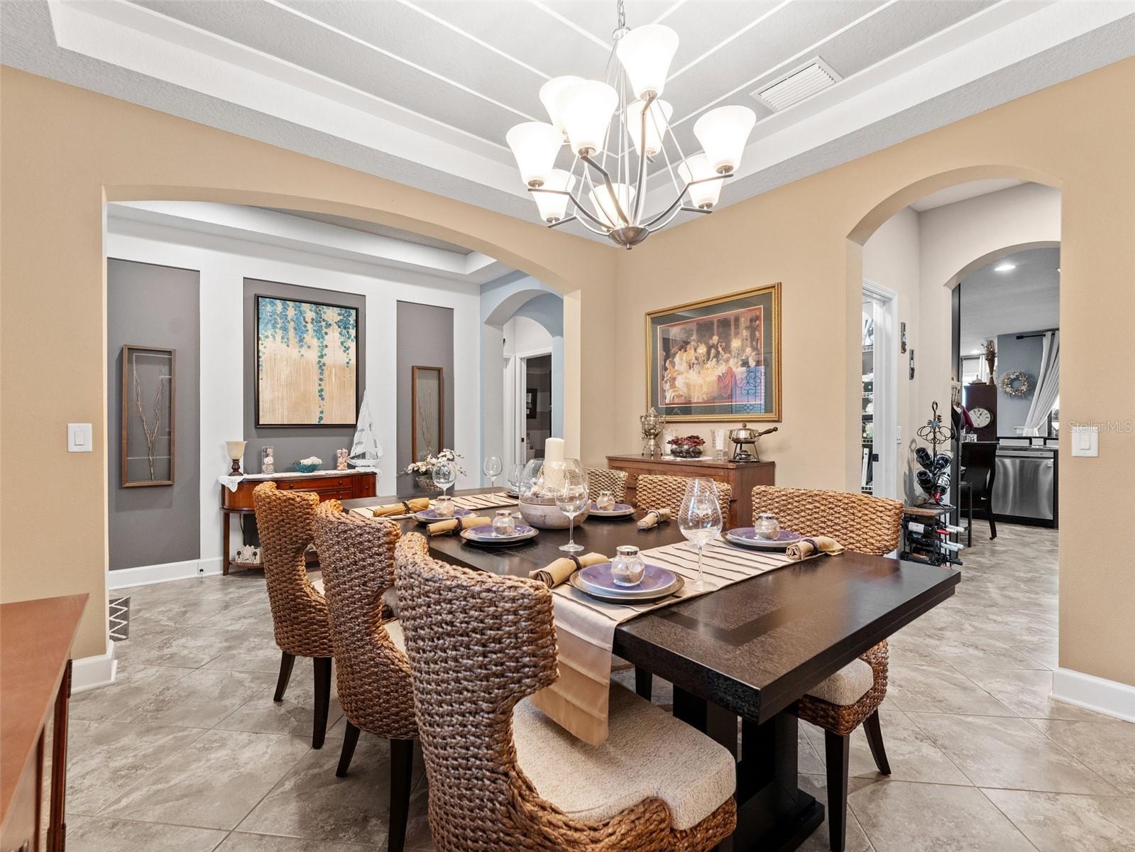 Formal dining room can also be used as a den, library or office space