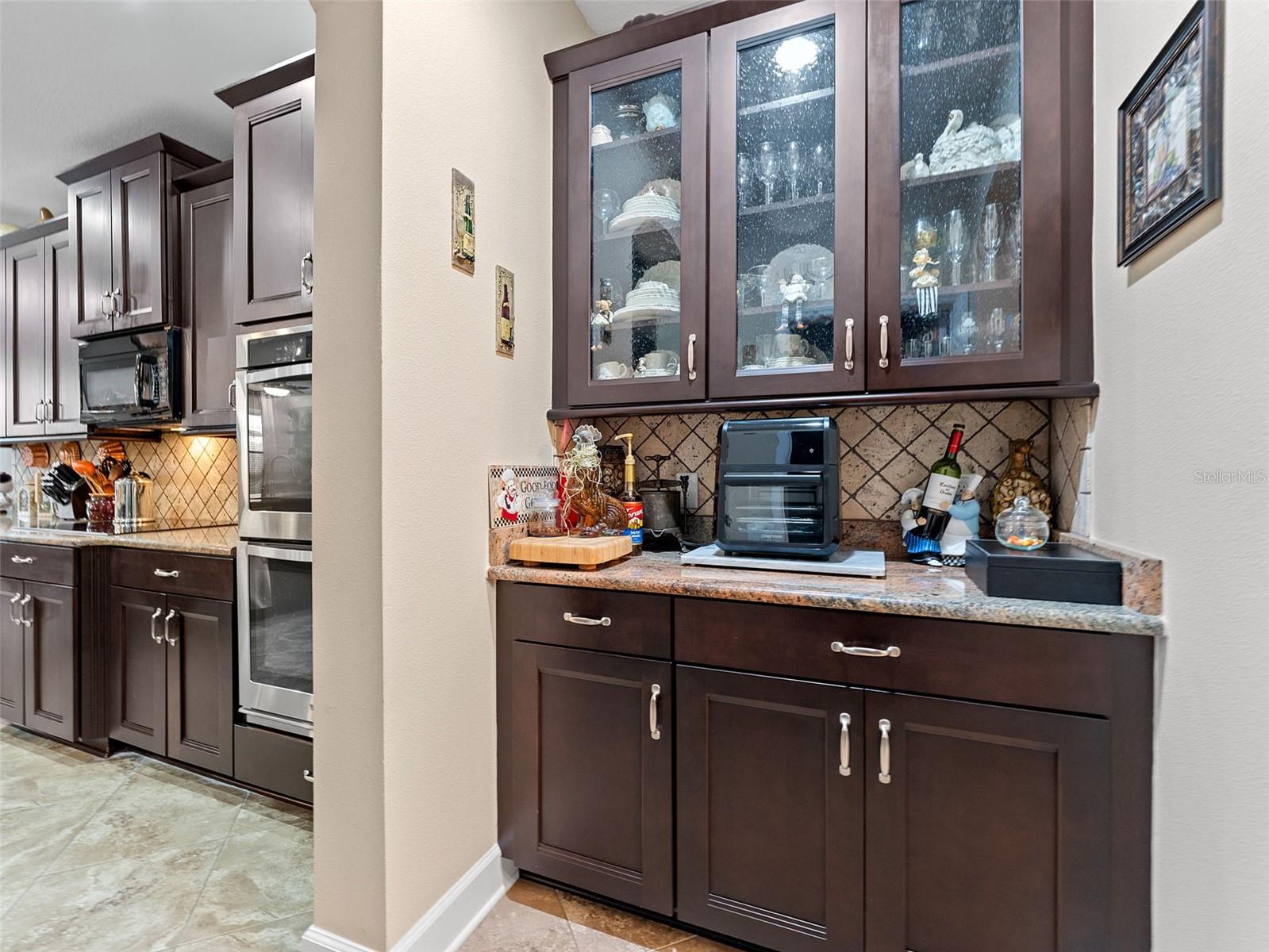 This butlers pantry is great ..can also be a coffee station and or cocktail bar.
