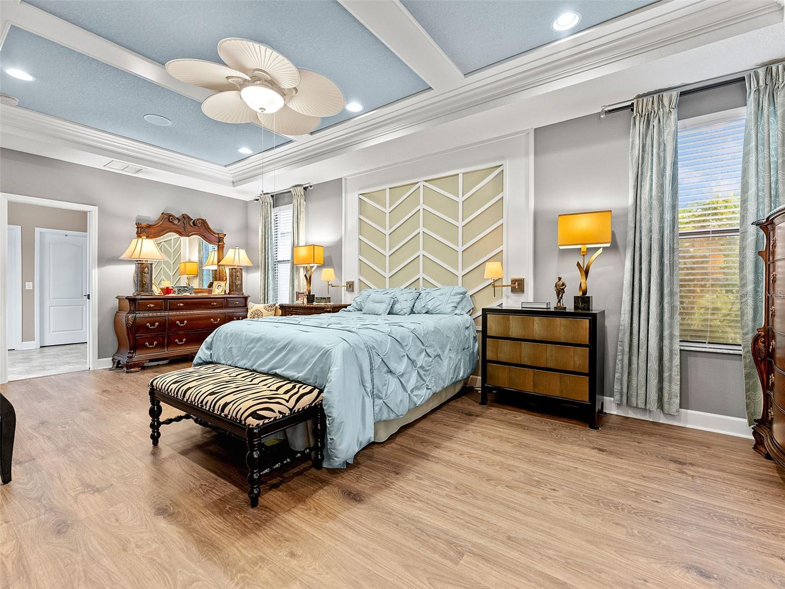 Primary bedroom, custom drapes and wall treatments