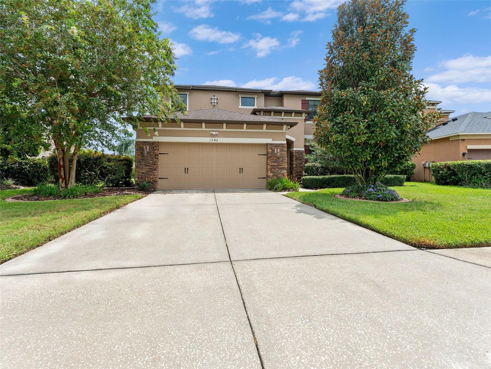 Nice sized driveway to oversized garage