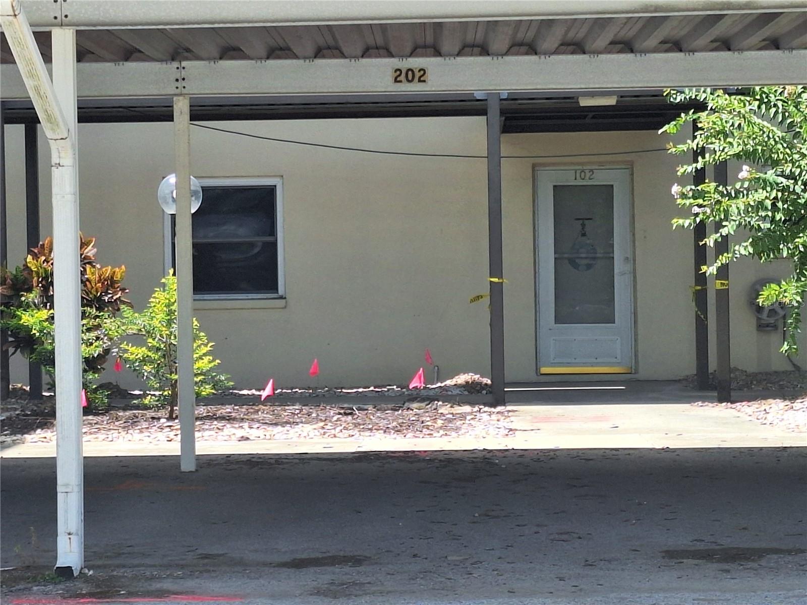 Covered Carport Right in Front of your Condo.