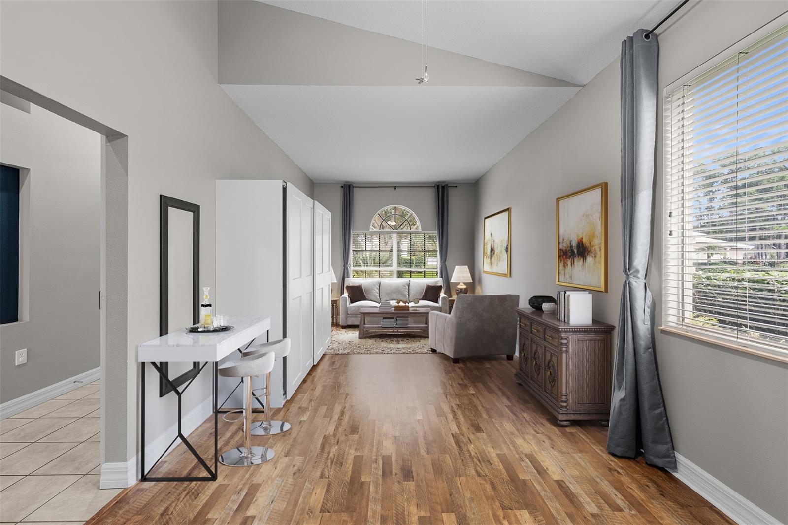 Living Room Dining Room could also be used as Bedroom Suite with built in Wardrobe Cabinet. Virtually Staged.