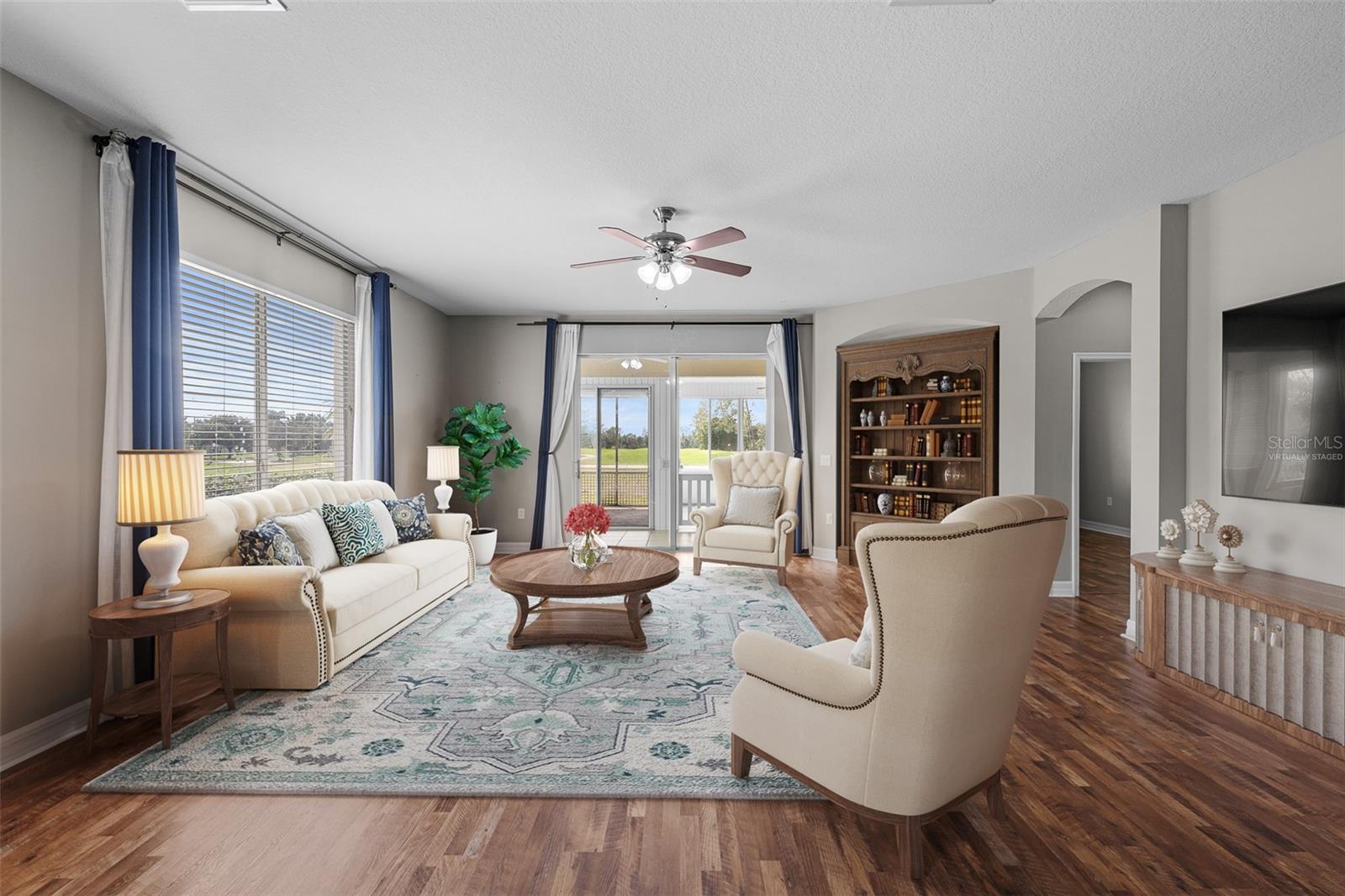 Great Room Opens up to Florida room and Kitchen has been virtually staged