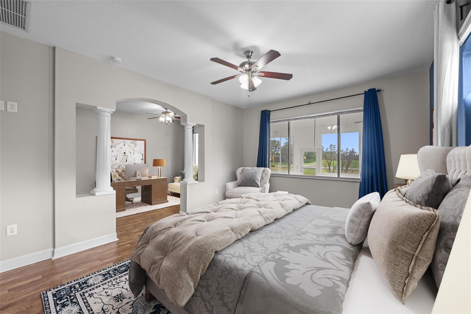 Master Bedroom overlooks golf course and has sitting room and en suite bathroom. Has been virtually staged.