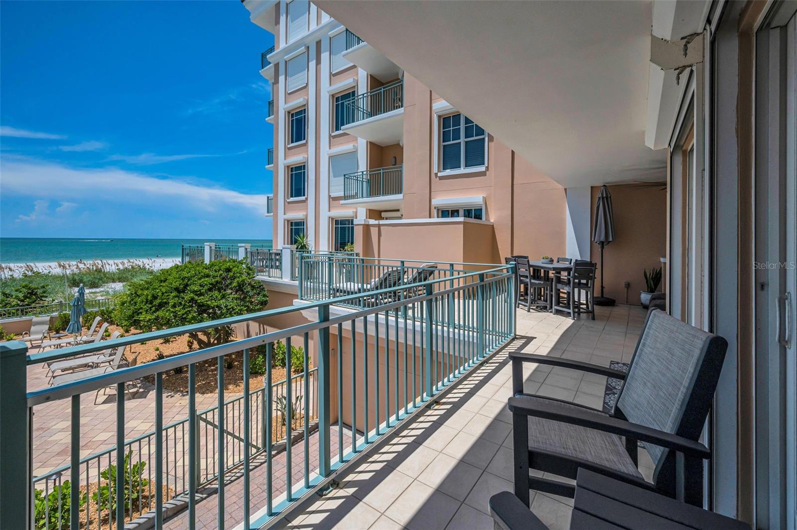The terrace wraps across the entire back of the unit.