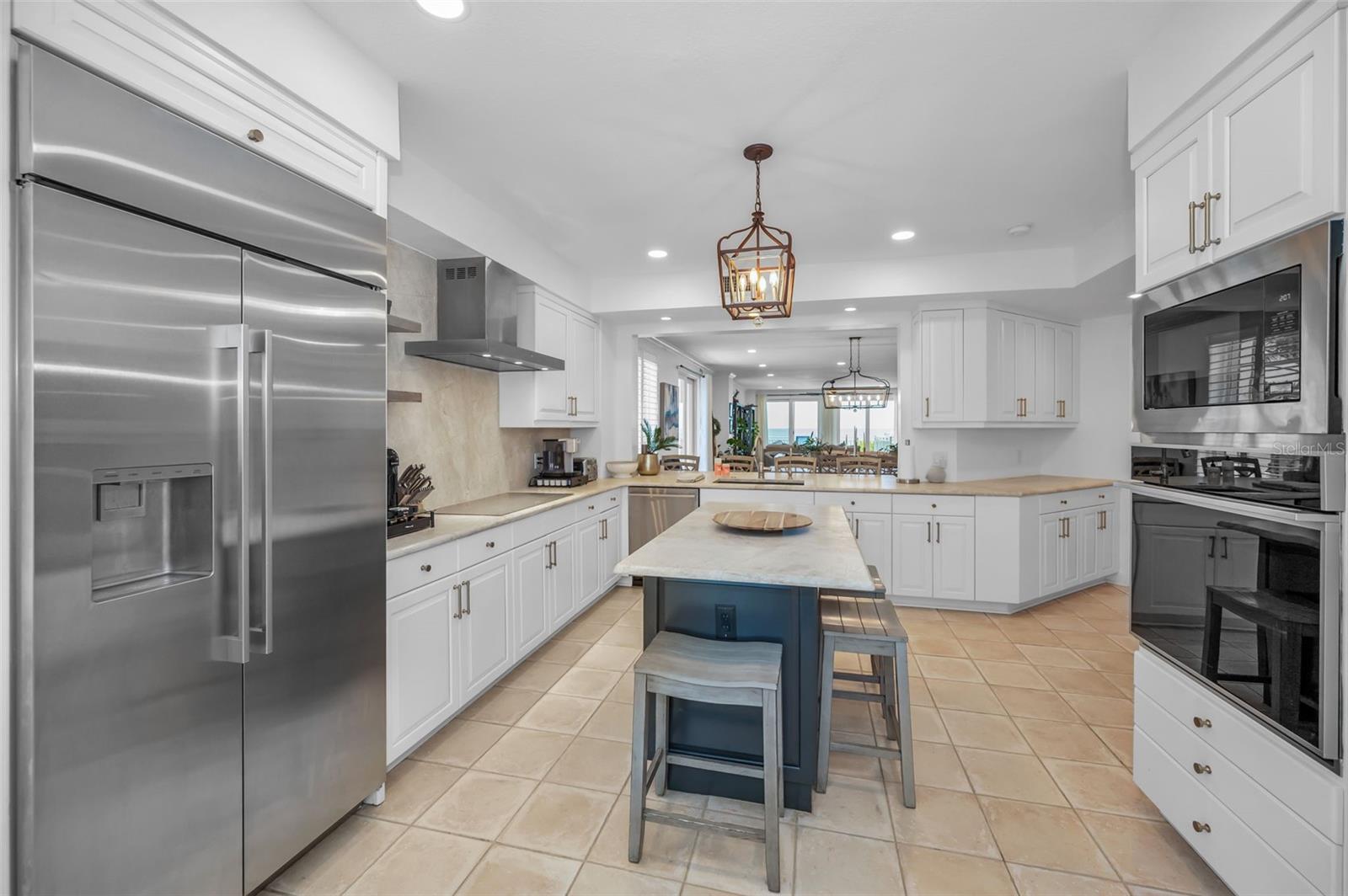 This kitchen is well laid out, very spacious, and has an incredible amount of counter space.