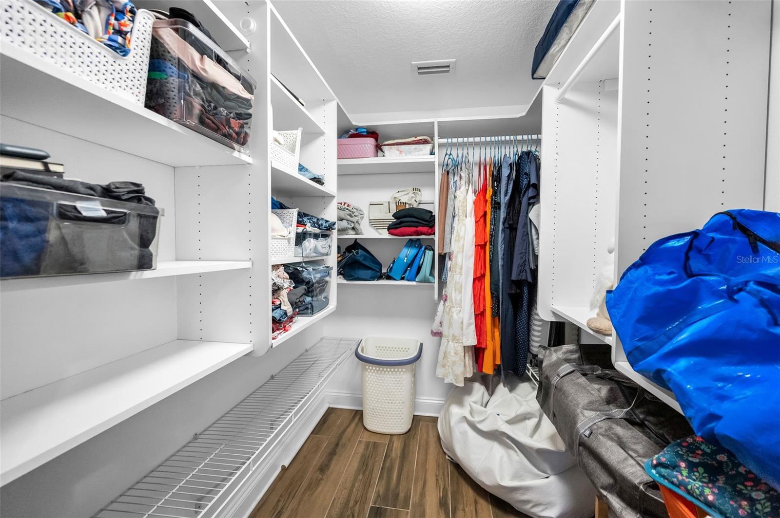Guest Suite - walk-in closet with organizers and space galore.