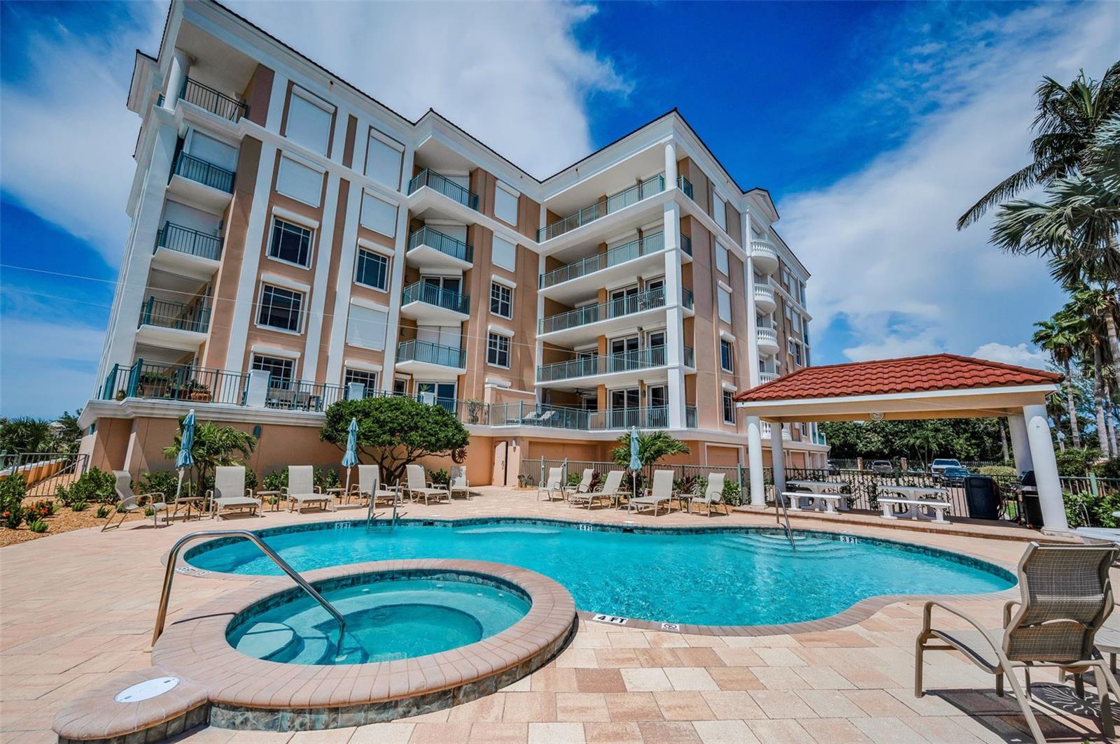 Beachfront pool area with view of Vittoria.