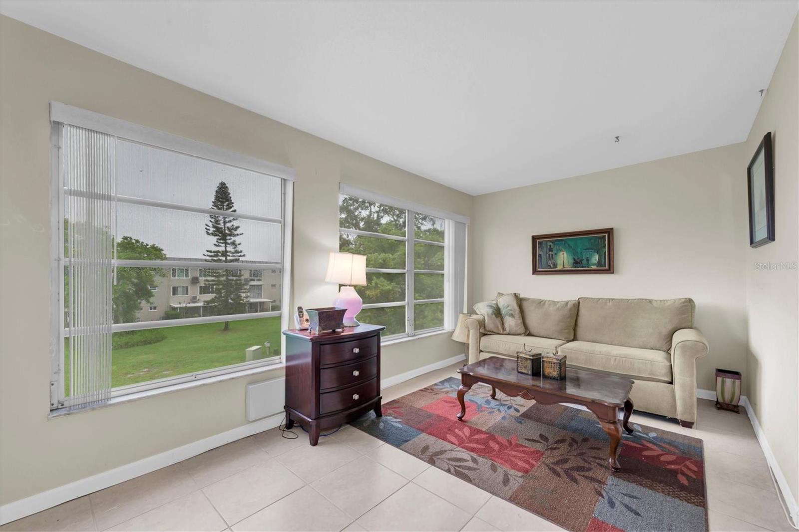 Florida room with lots of natural lighting.