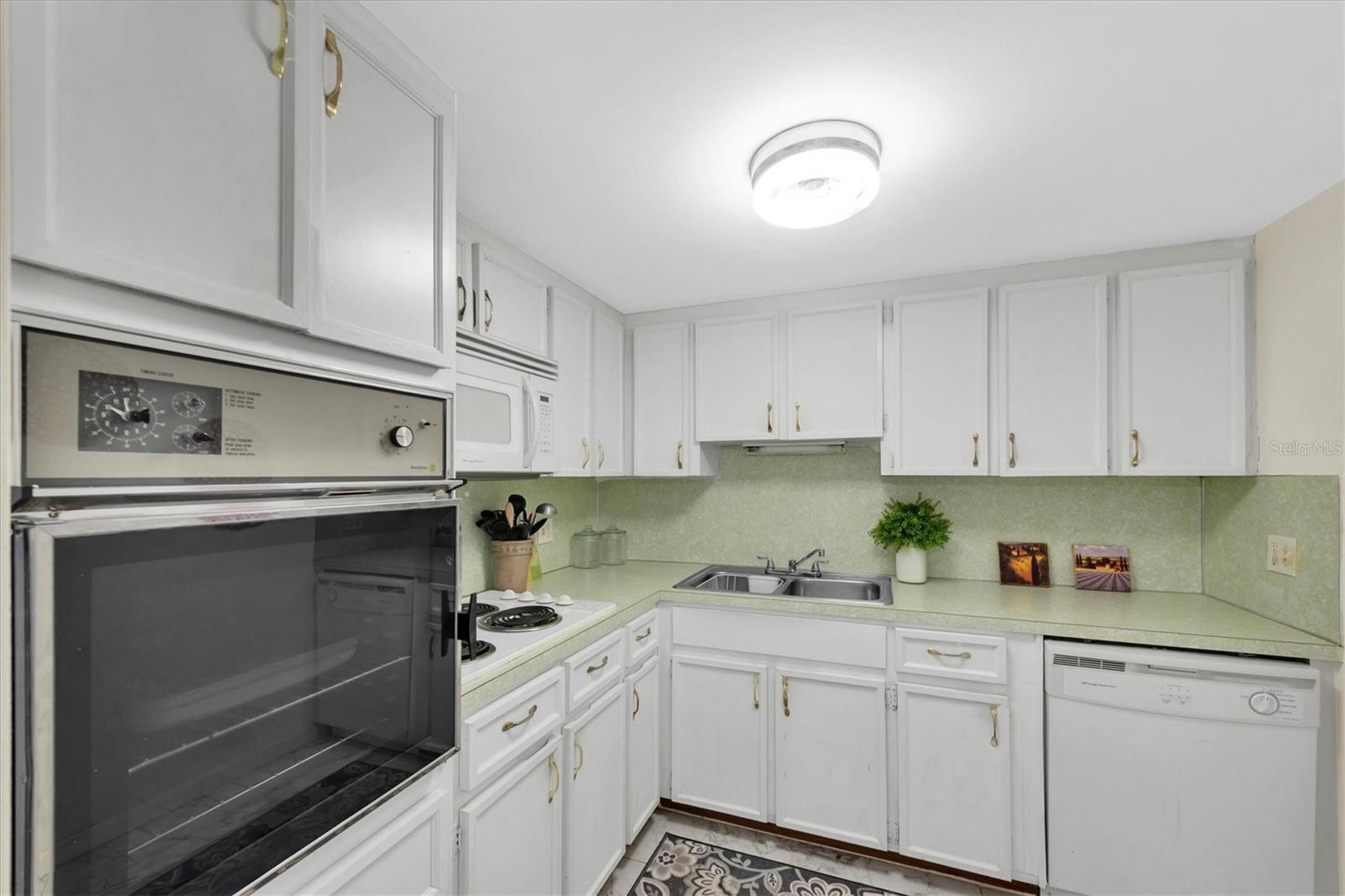 Kitchen with plenty of cabinets and counter space.