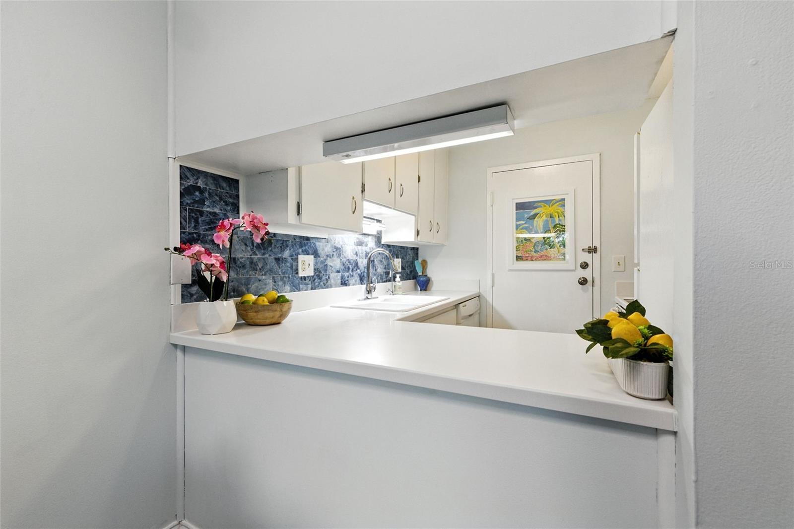View from living/dining room into the kitchen