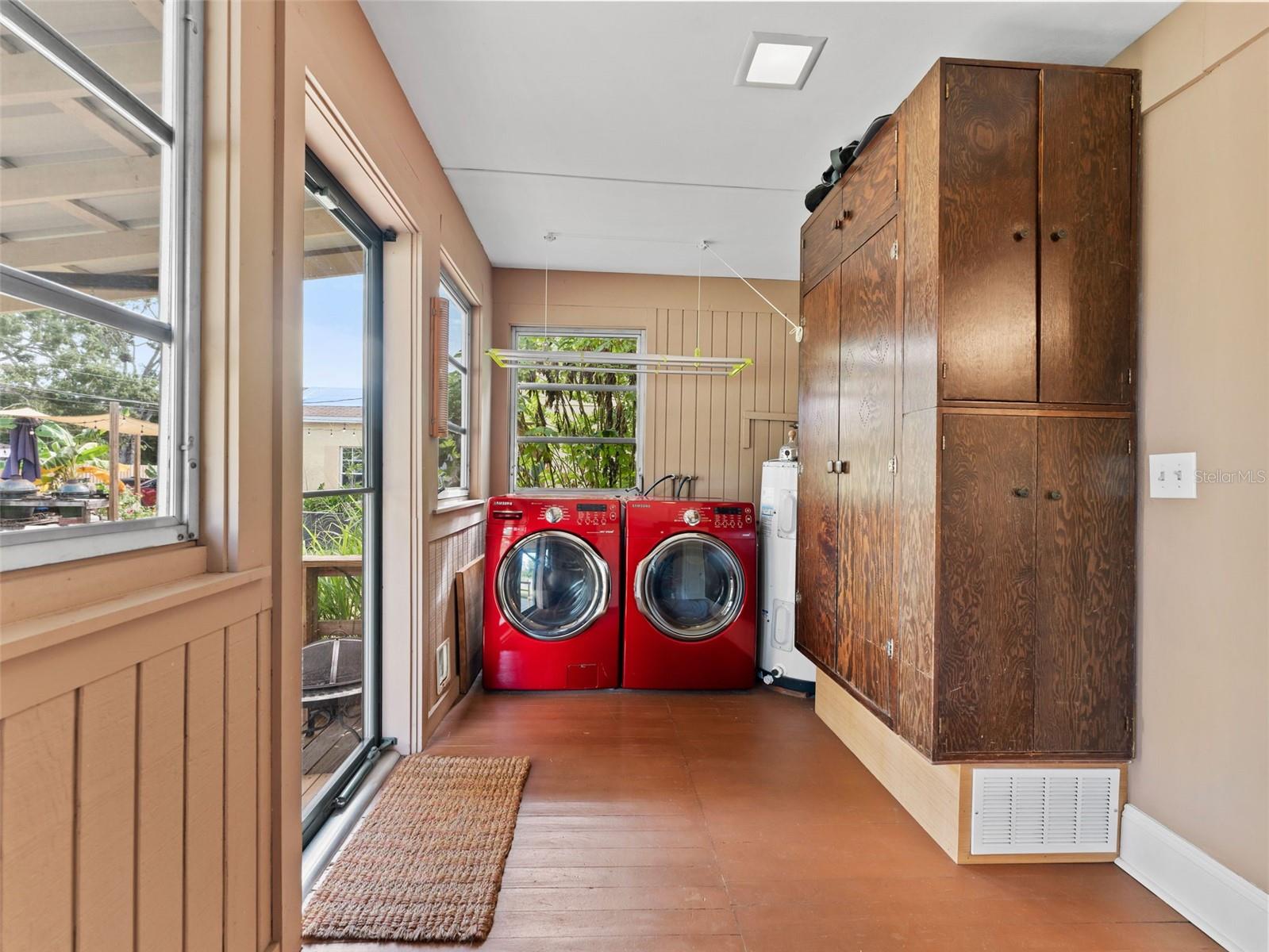 Mudroom, laundry room and storage! This room also has a powder bath for guests.